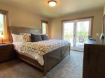 Master bedroom with a king size bed
